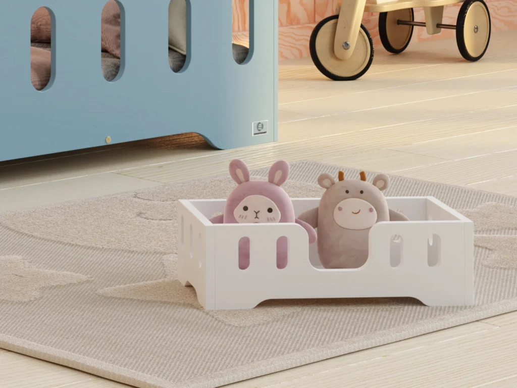 Lit en bois pour poupées avec des ouvertures ovales dans les barrières et une entrée centrale en blanc